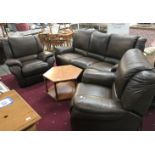 A brown leather 3 piece suite