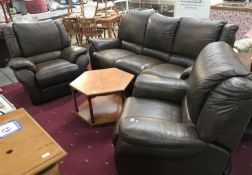 A brown leather 3 piece suite