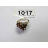 A Marquise garnet cluster ring in 9ct yellow gold, size N. Total weight 4.4 grams.