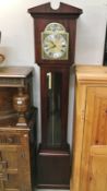 A modern cased clock (size is not a full size grandfather clock)