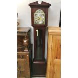 A modern cased clock (size is not a full size grandfather clock)