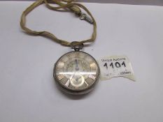 A silver pocket watch with London hall mark, 1865/65 with gold leaf feature.