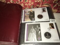 An album of 30 mint commemorative coin covers, Elizabeth II together with 1986 Royal wedding stamps,