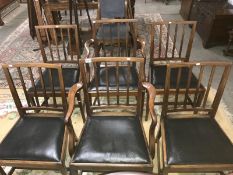 A set of 6 oak dining chairs.