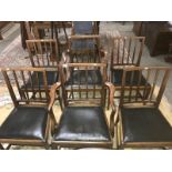 A set of 6 oak dining chairs.