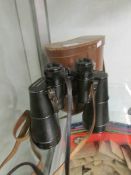 A cased pair of Lieberman & Gortz extra wide angle 10 x 60 binoculars.