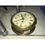 A Smith's brass military issue ship's clock.