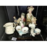 An interesting collection of pottery and porcelain items including Victorian, bisque, pie top,