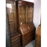 An oak bureau book case.