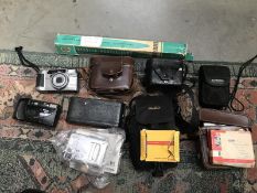 A quantity of cameras including Voigtlander Kodak Instamatic 204 plus accessories