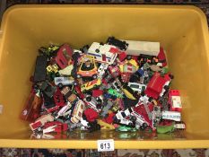 A large box filled with Die-cast toy cars,