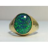 A 9ct gold ring set with a 10ct Australian fire opal