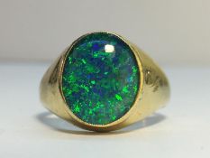 A 9ct gold ring set with a 10ct Australian fire opal