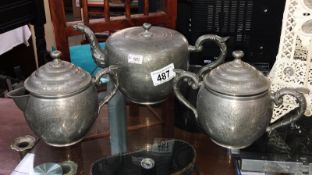 A Nguan Kwang Heng Swatow oriental pewter tea set