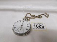 A silver pocket watch with second hand and on metal chain, a/f.