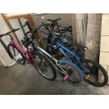 2 BMX bikes and 1 mountain bike