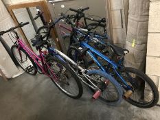 2 BMX bikes and 1 mountain bike