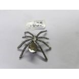 A large vintage spider brooch.