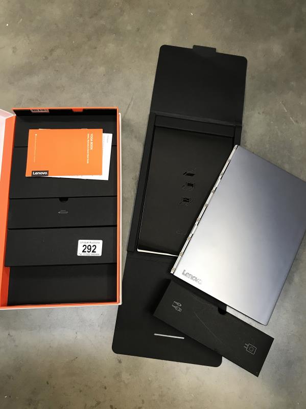 A Lenovo yoga book in box