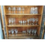 A collection of drinking glasses (3 shelves)