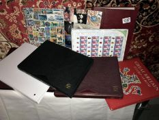 A collection of stamps including 14 generic sheets, albums of mint stamps, sheets,