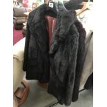 2 fur coats (1 faux)