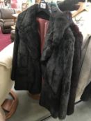 2 fur coats (1 faux)