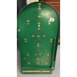 A green painted bagatelle