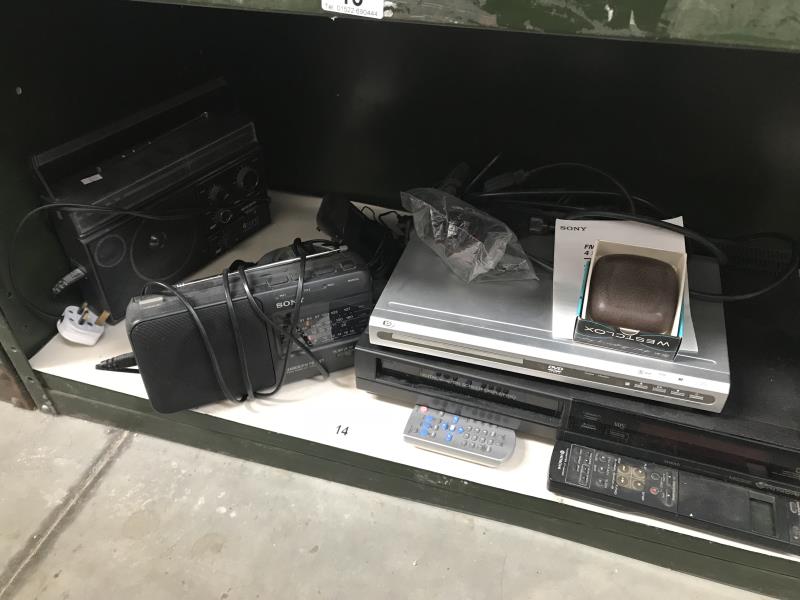 A Hitachi video recorder, Dolby DVD player, Sony radio, Morphy Richards radio etc.