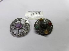 A Scottish silver brooch set amethyst and a Scottish silver brooch set coloured 'pebbles'.