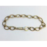 A 9ct gold bracelet (9 gms)