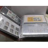 2 large albums of Royal Mail presentation packs (with high face value) and 2 other books of stamps.