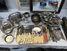 A quantity of cutlery and silver plate including a Mappin & Webb sugar bowl and a Walker & Hall