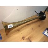 A vintage brass air horn