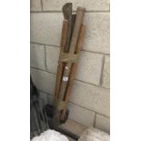 2 long handle axes,