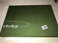 A slip cased edition (180/230) containing 14 horse racing themed lithographs on Japan paper.