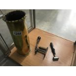 A brass trench art shell case, a cartridge maker and a gun powder measure.