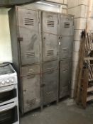 An old metal 6 cupboard locker unit