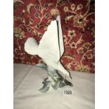 A large Lladro dove in good condition,.