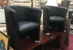 2 leather tub chairs