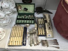 A quantity of cutlery including cased