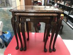 3 wooden tables with glass top inserts