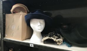 A quantity of hats and an old hat box