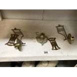 A pair of Edwardian brass piano sconce candle sticks & chamber stick