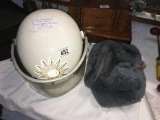 Circa 1960/70's West German police riot helmet with North Rheine Westphalia badge & USSR cap with