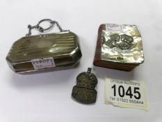 A silver purse (HM Boots Pure Drug Company, Birmingham 1916) A silver ARP badge (HM J. C.