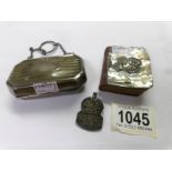 A silver purse (HM Boots Pure Drug Company, Birmingham 1916) A silver ARP badge (HM J. C.