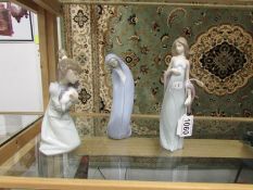 3 Lladro figurines including The Virgin Mary.
