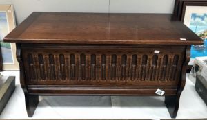 A dark oak coffer