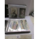 2 albums of postcards including topographical, actresses etc.